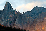 Snowden Mountain in the Brooks Range, viewed here from the north, is one of the most impressive peaks along the Dalton Highway.  It's coloration is striking in the evening light out of the west. From Dalton Highway in Alaska.