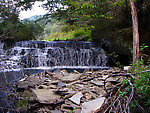 This old artificial dam (possibly the former site of a bridge) creates a nice little trout pond upstream. From the East Branch of Trout Brook in New York.